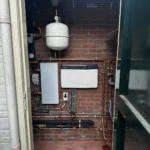 Warmtepomp installatie met buffervat en cv-leidingen